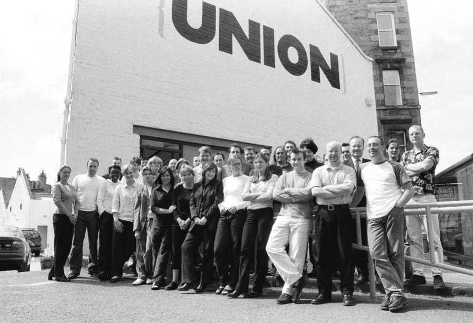 Black and White image of large group on people standing outside the Union office building