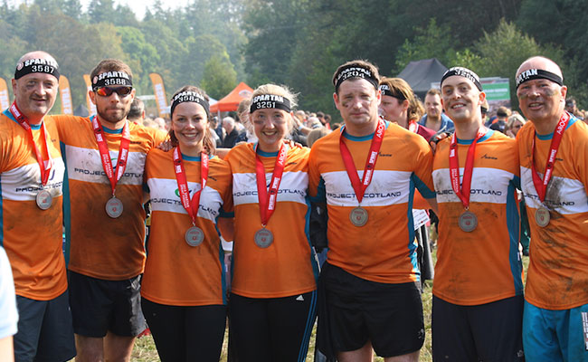 A happy team of Unionites with their medals after the Spartans ordeal.