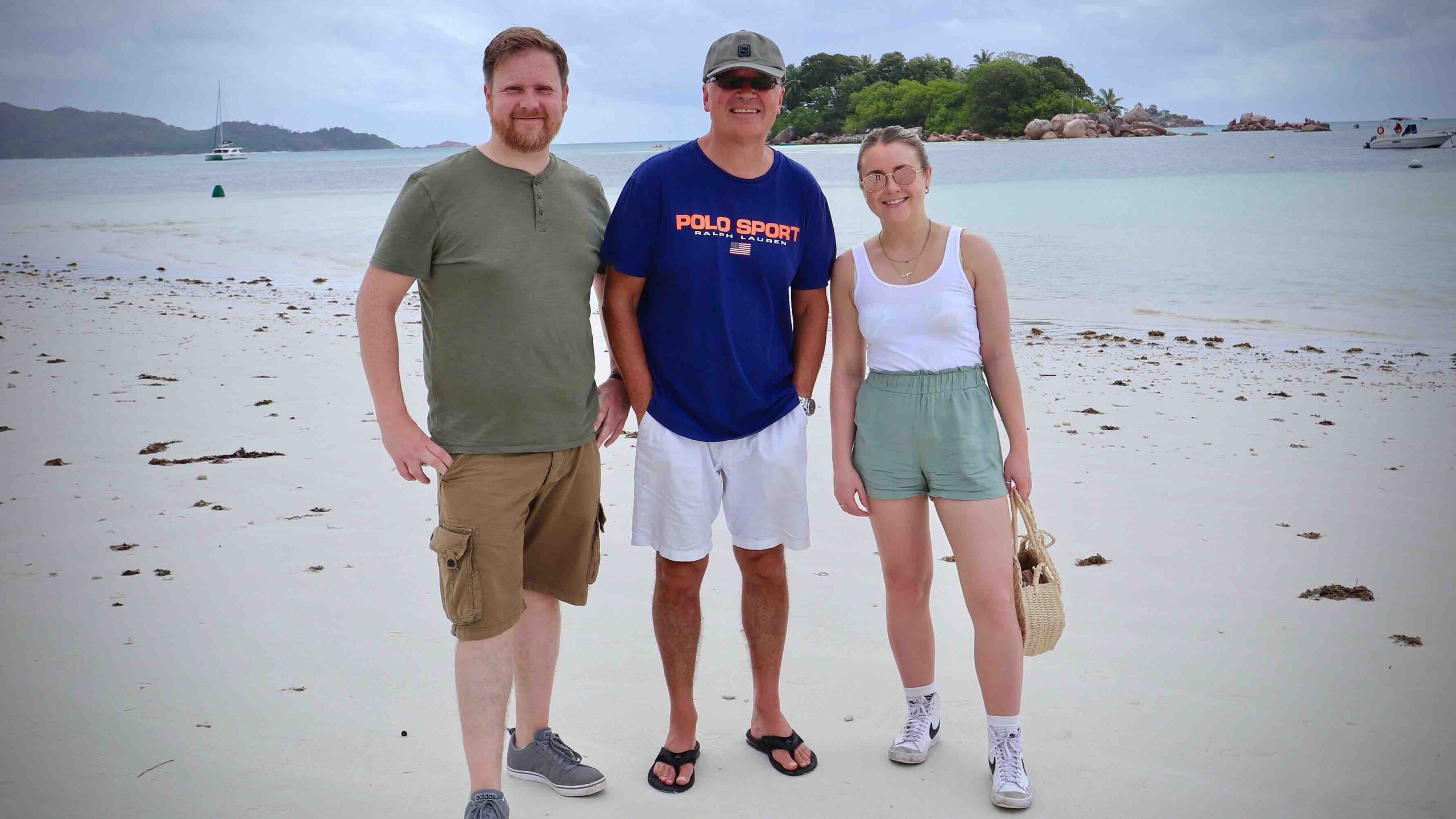 Group of three people on a beach