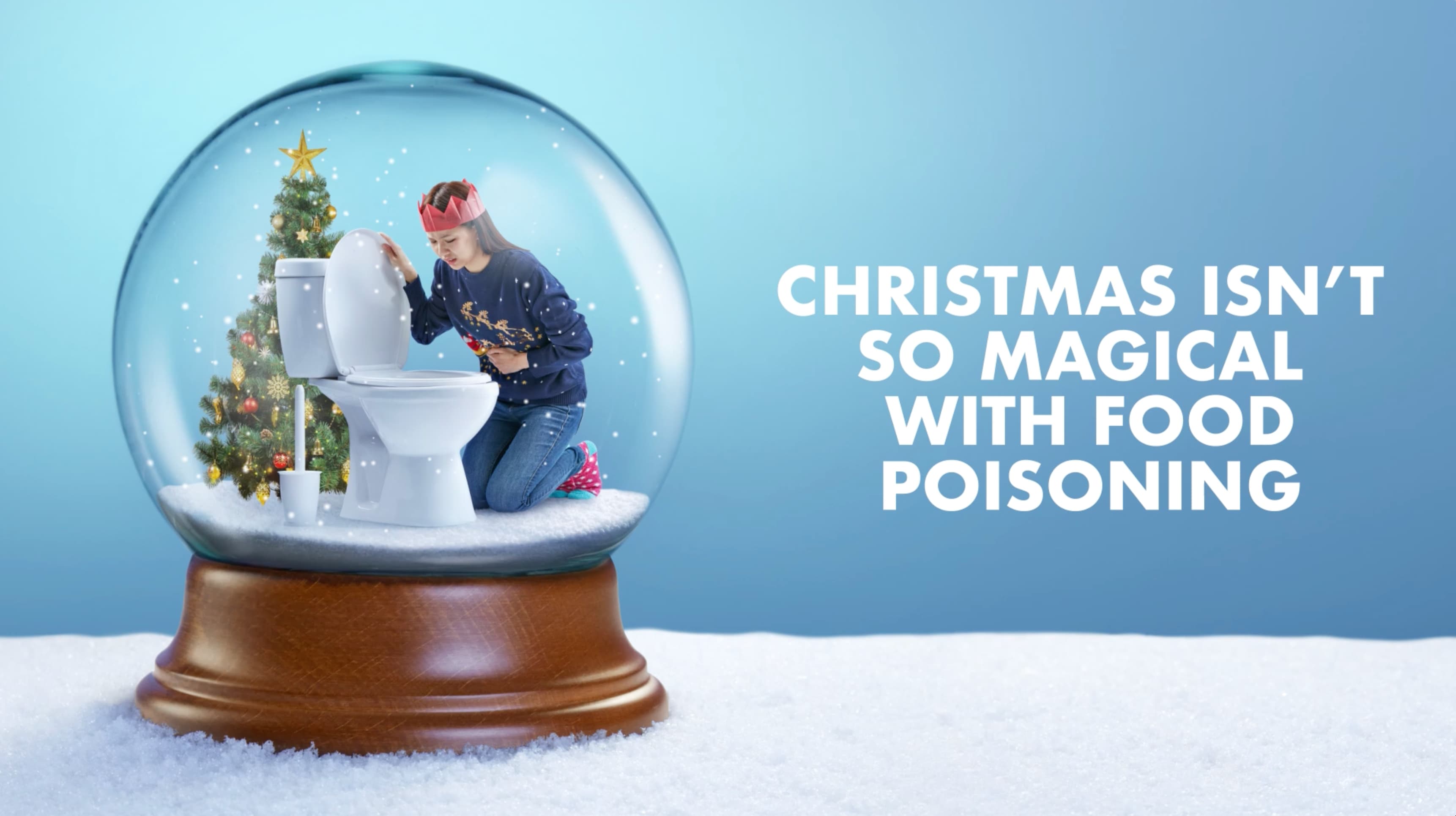 woman sick by toilet and in a snow globe