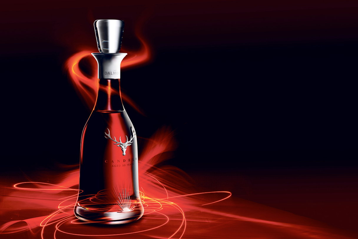 Dalmore whiskey bottle with a red swirl effect wrapping the bottle