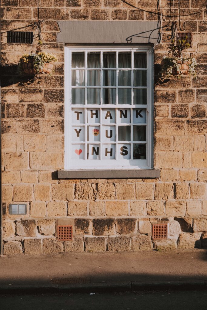 Thank you message in a house window