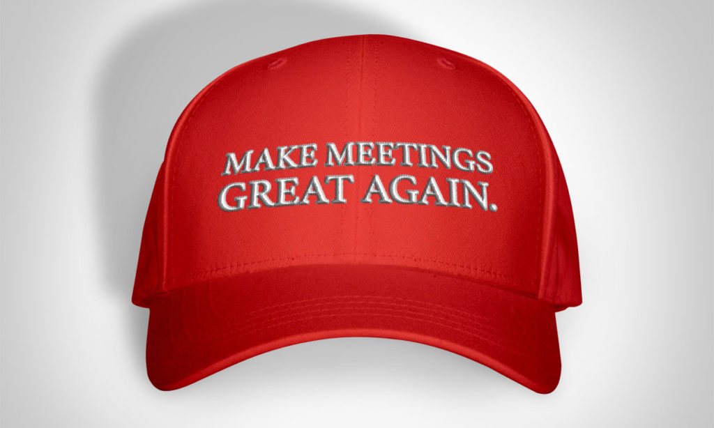 Red baseball cap with Make meeting great again written on it