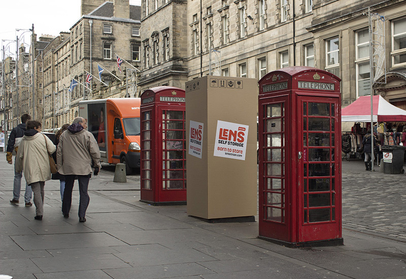 Lens Storage marketing campaign with items on the street boxed up