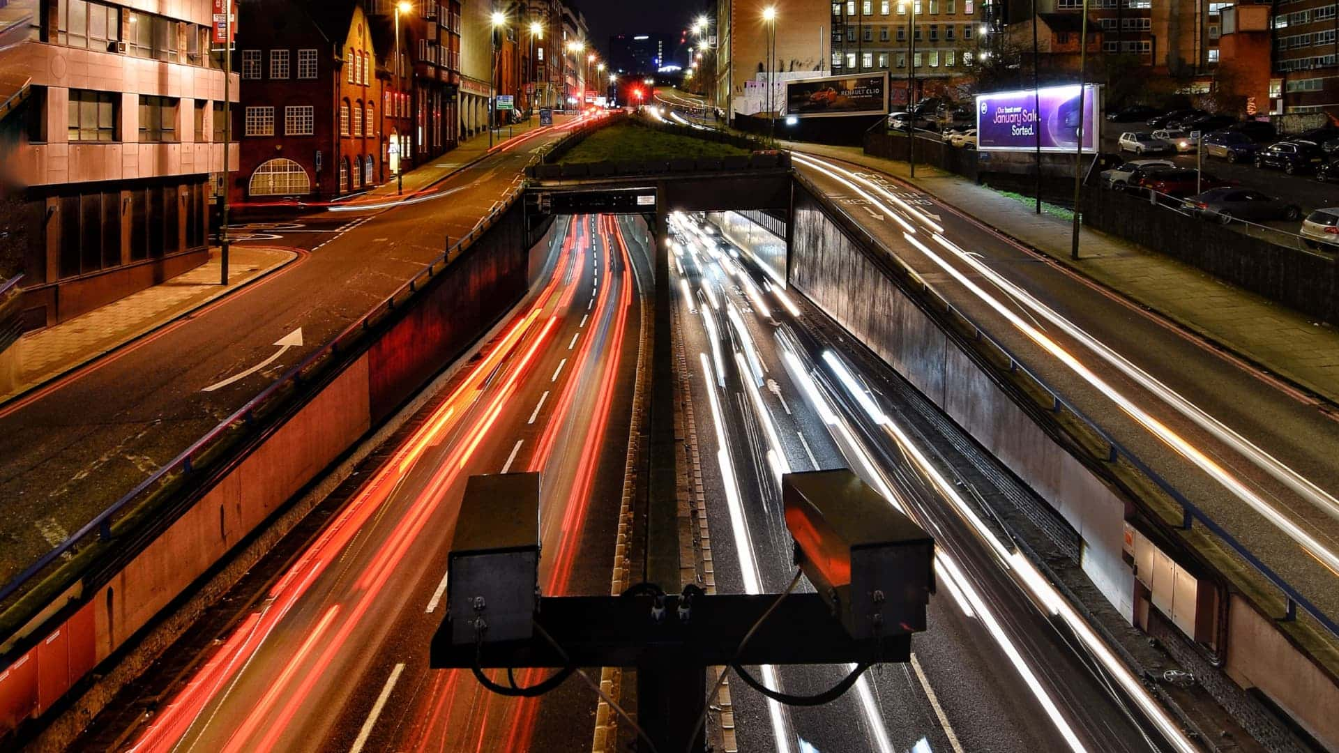 Traffic at night, slow caption exposure of lights moving at speed