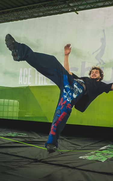 Man jumping on trampoline 