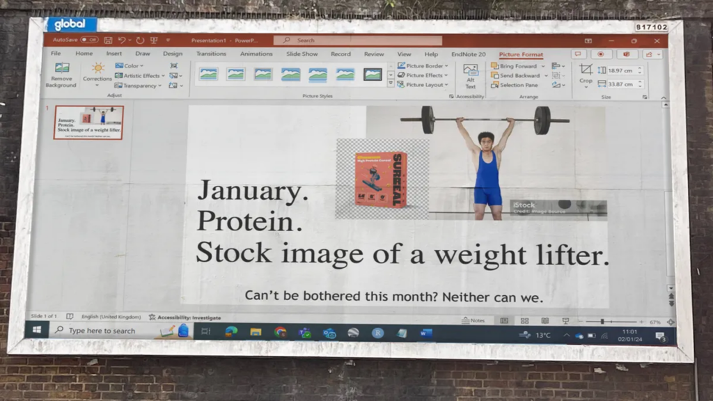 Wall ad with Poerpoint slide being created of a cartoon character lifting weights