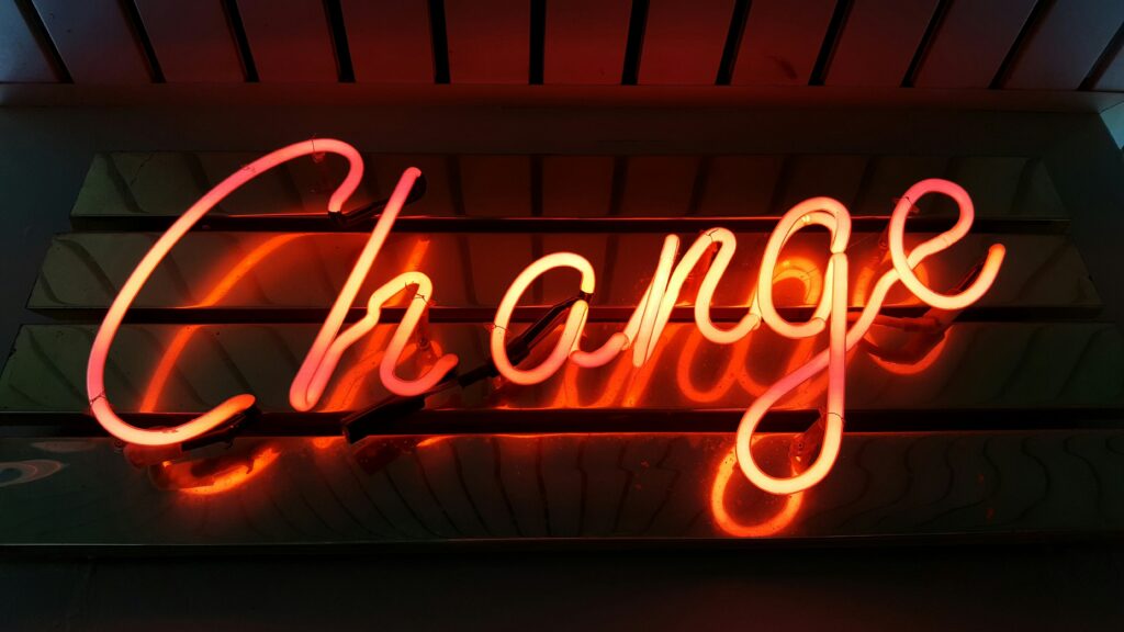 Change neon sign in red letters