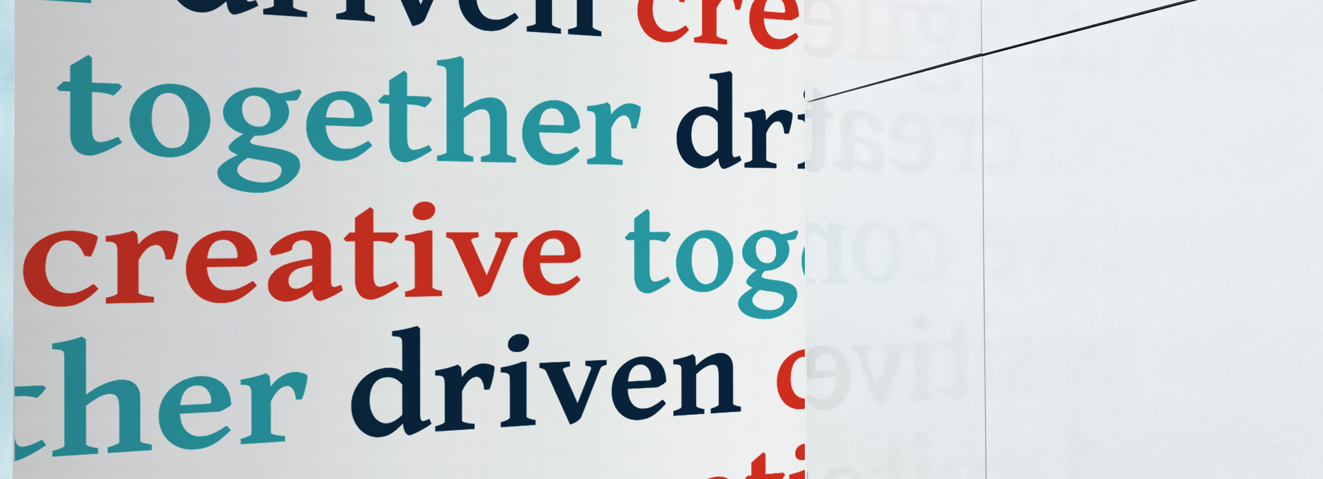 The Union three values displayed on a wall in the office
